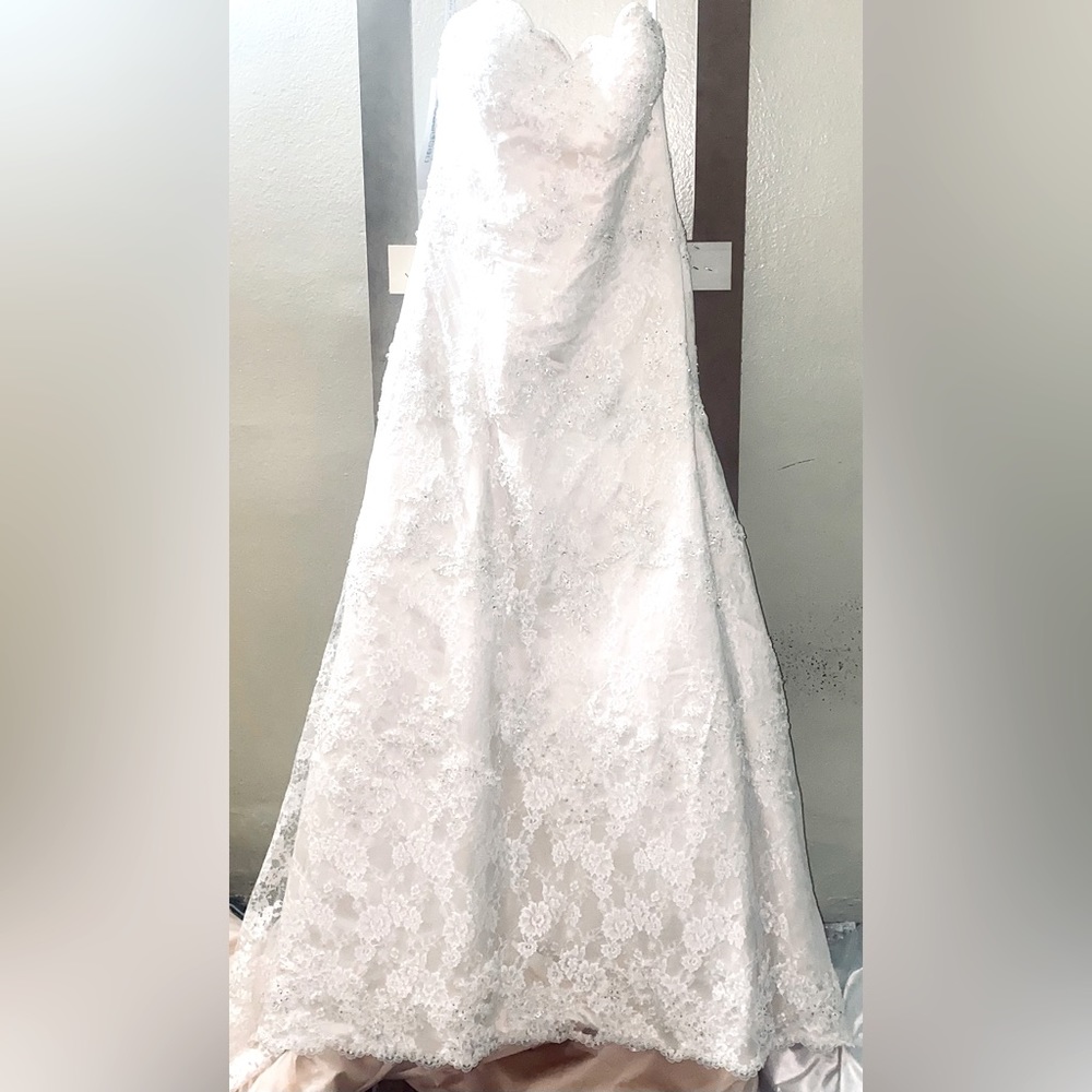 Beautiful- new - size 10 - white - great for anyone slimmer than me lol..